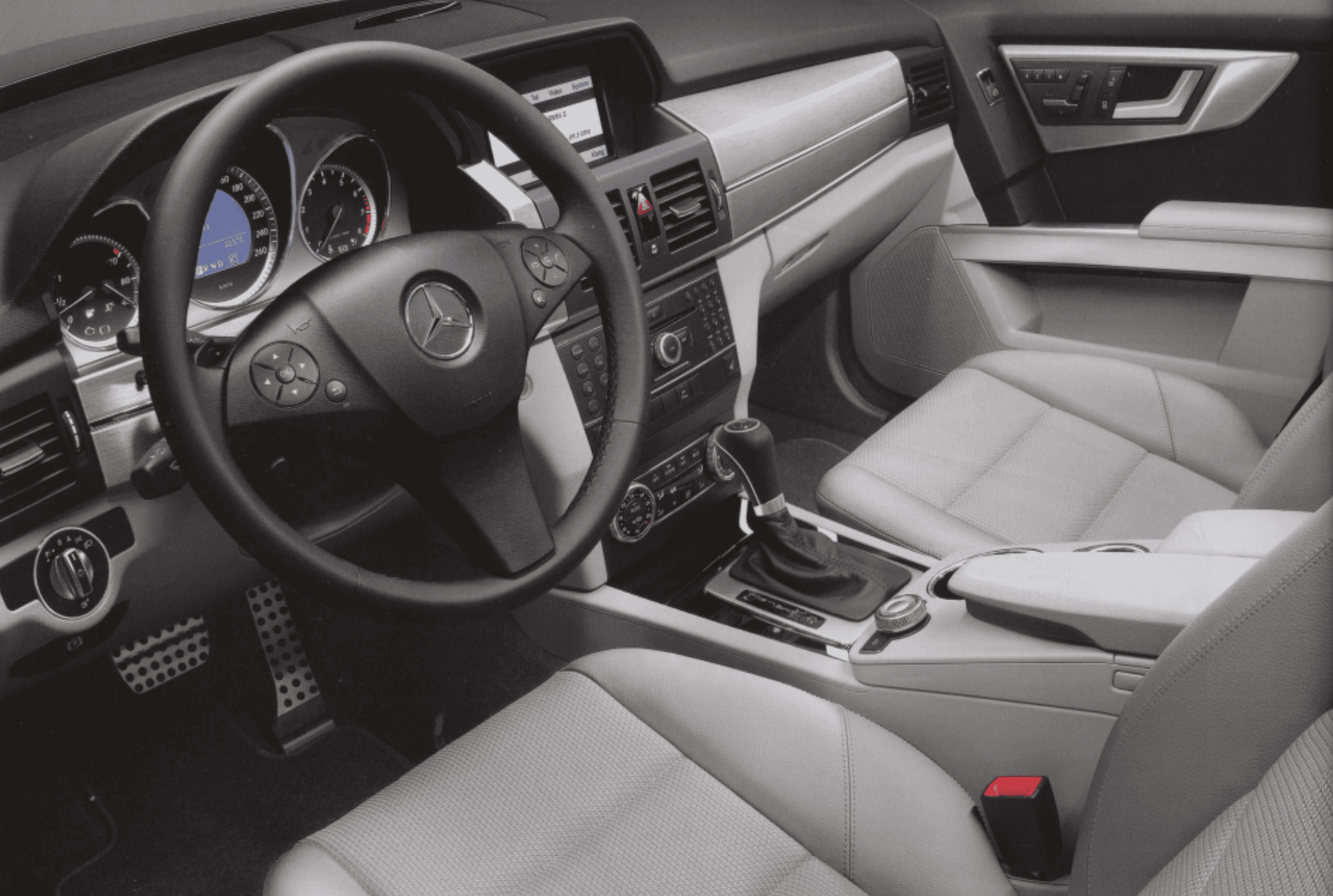 Interior cockpit view showing the steering wheel and dashboard layout