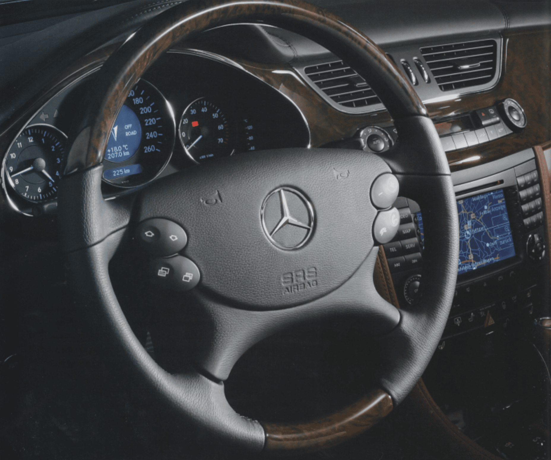 Black leather steering wheel and dash