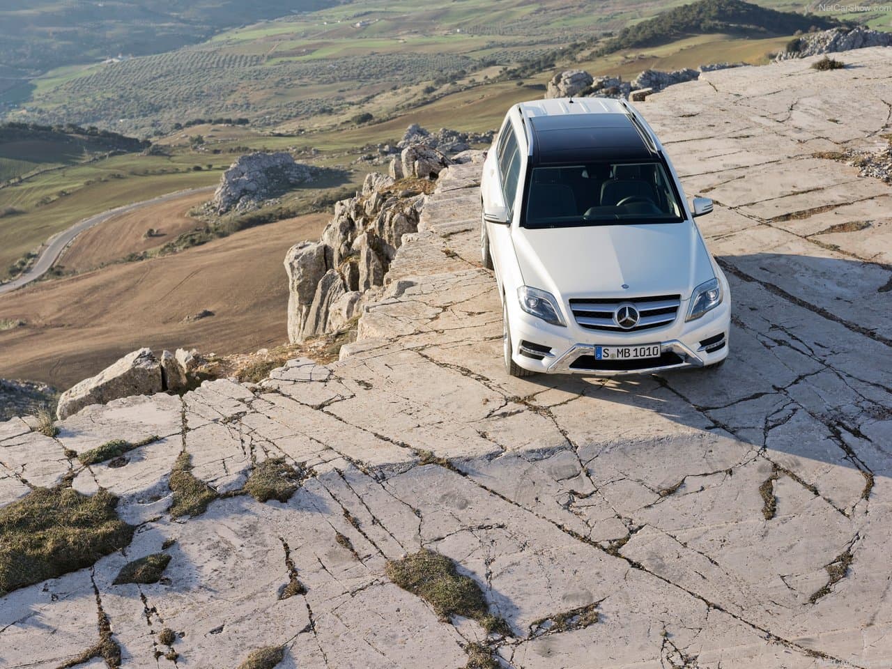 High angle drone view parked on white rock surface